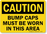 Caution Bump Caps Must Be Worn Sign