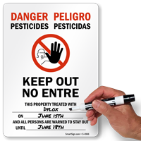 Bilingual Pesticides Keep Out No Entre Sign